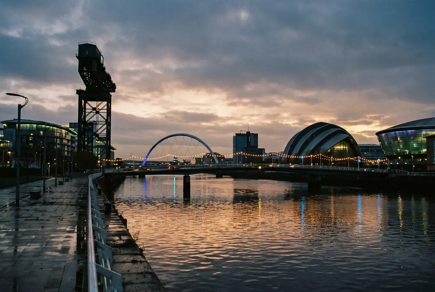 Glasgow at dusk along the River Clyde with the Finnieston Crane
